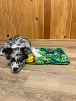 Sniff Safari rest — real pet exploring the snuffle mat
